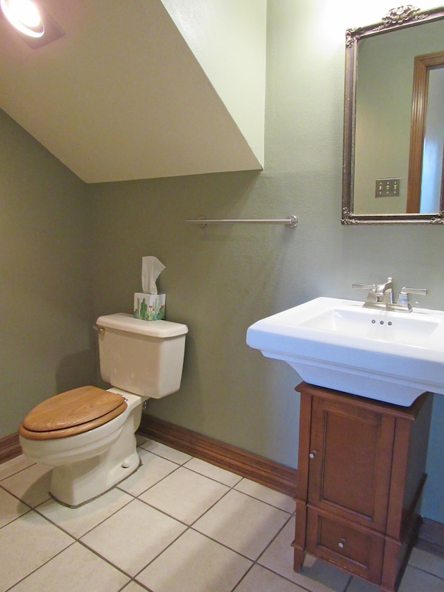620 20th St, Beaumont, TX 77706 - bathroom with tile patterned floors and vanity