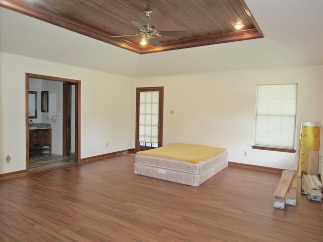 620 20th St, Beaumont, TX 77706 - bedroom featuring a tray ceiling, wood finished floors, wooden ceiling, and connected bathroom