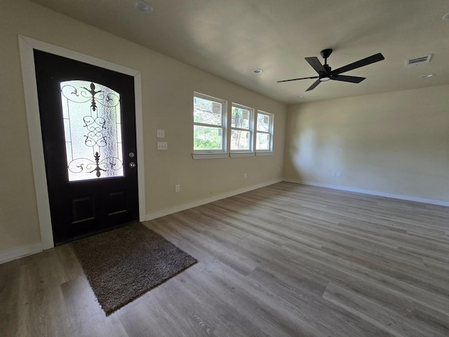 3435 Kenwood Dr, Beaumont, TX 77706 - foyer featuring baseboards, visible vents, and wood finished floors