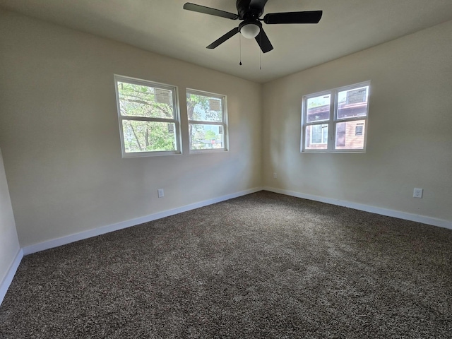 3435 Kenwood Dr, Beaumont, TX 77706 - spare room with baseboards, ceiling fan, and carpet flooring