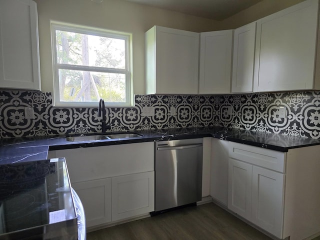 3435 Kenwood Dr, Beaumont, TX 77706 - kitchen featuring a sink, electric range oven, stainless steel dishwasher, dark countertops, and white cabinets