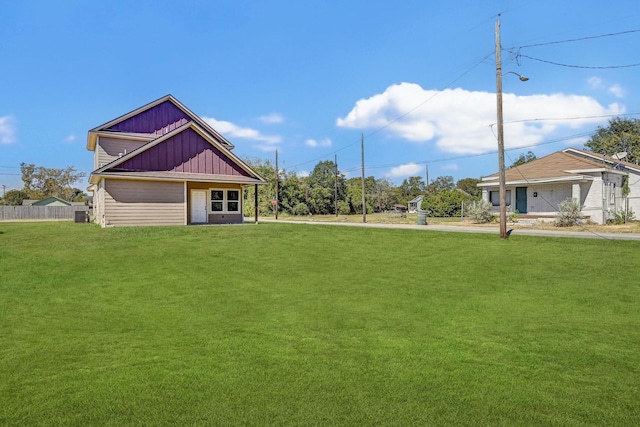 view of yard with central AC