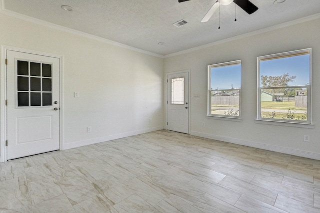 unfurnished room featuring ceiling fan and ornamental molding