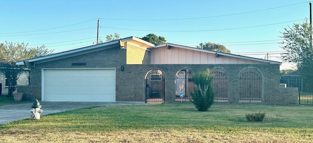 view of front of home with a garage and a front yard