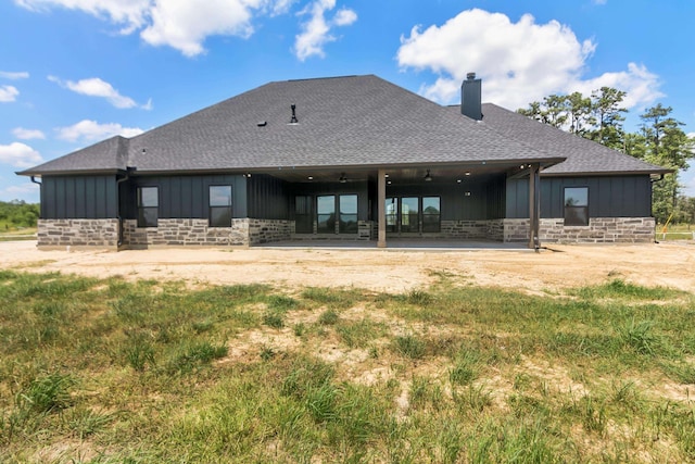 back of house with ceiling fan and a patio area