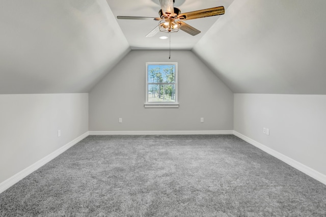 bonus room featuring carpet flooring, vaulted ceiling, and ceiling fan