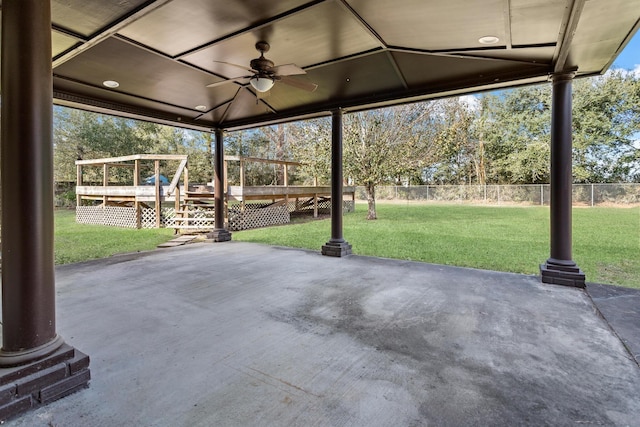 view of patio featuring ceiling fan and a wooden deck