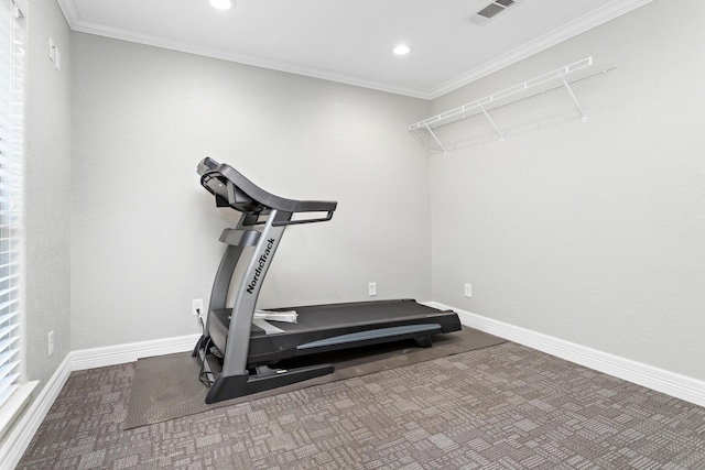 workout area with carpet flooring and ornamental molding