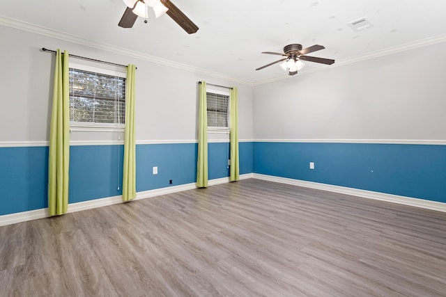 unfurnished room featuring light hardwood / wood-style flooring, ceiling fan, and ornamental molding