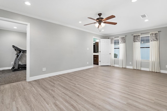 unfurnished living room featuring ceiling fan, light hardwood / wood-style floors, and ornamental molding