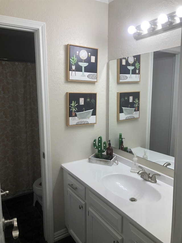 full bathroom featuring toilet and vanity