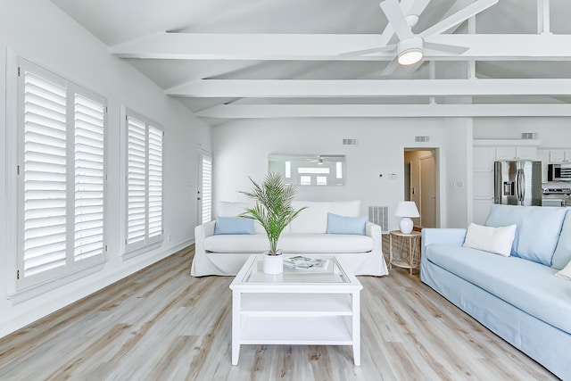 living room featuring ceiling fan, light hardwood / wood-style floors, beam ceiling, and high vaulted ceiling