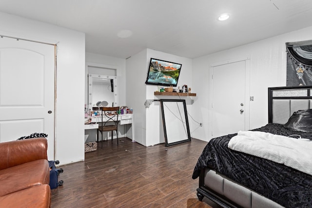 bedroom featuring dark hardwood / wood-style flooring