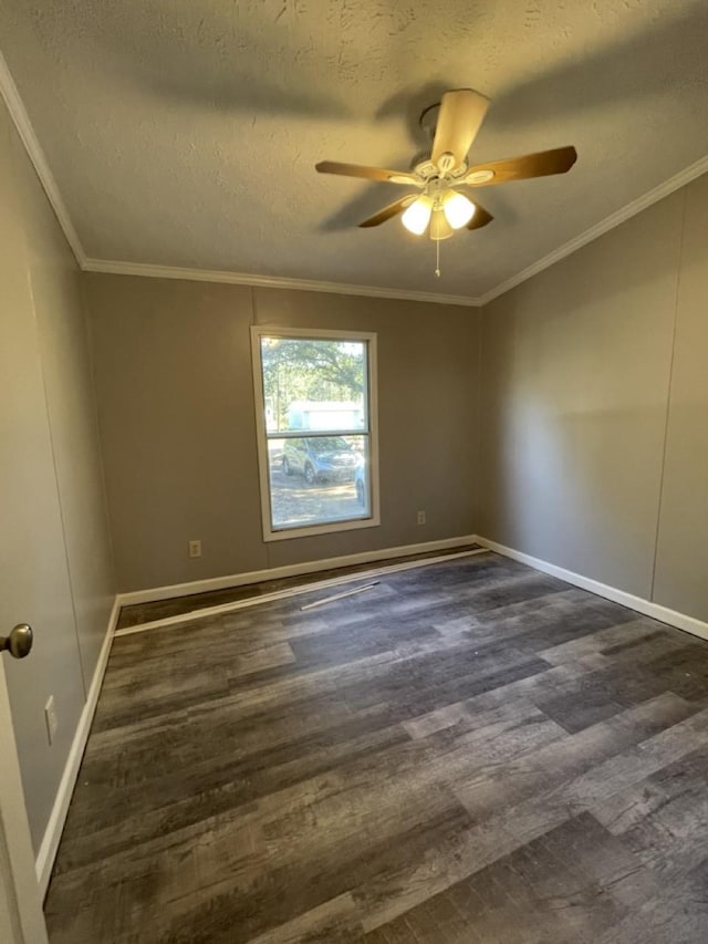 empty room featuring ceiling fan, dark hardwood / wood-style flooring, crown molding, and a textured ceiling