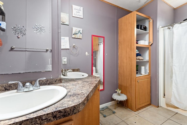 bathroom featuring vanity, a shower with curtain, and tile patterned flooring