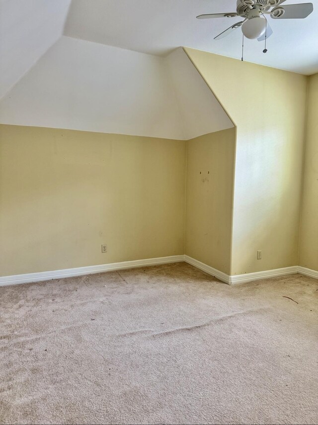6400 Chasse Gdns, Little Cypress, TX 77632 - additional living space featuring a ceiling fan, lofted ceiling, carpet, and baseboards