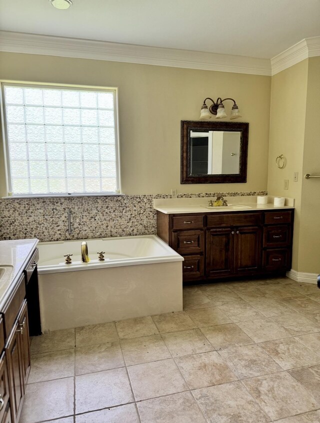 6400 Chasse Gdns, Little Cypress, TX 77632 - bathroom featuring vanity, a garden tub, and crown molding