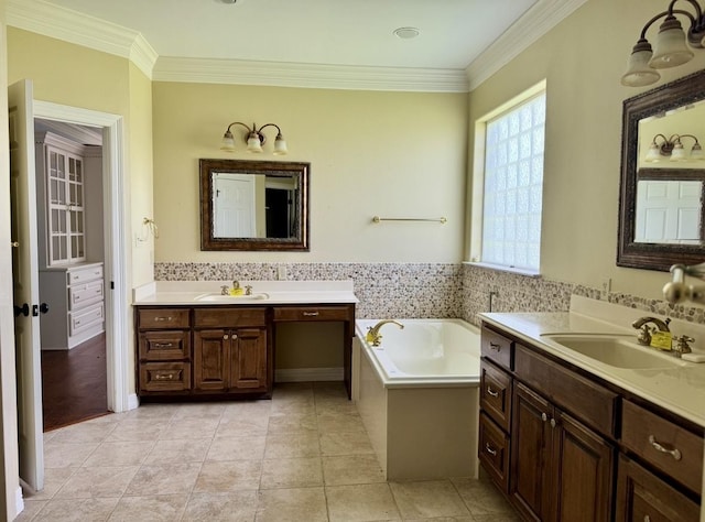 6400 Chasse Gdns, Little Cypress, TX 77632 - full bath with ornamental molding, a bath, two vanities, and tile patterned floors