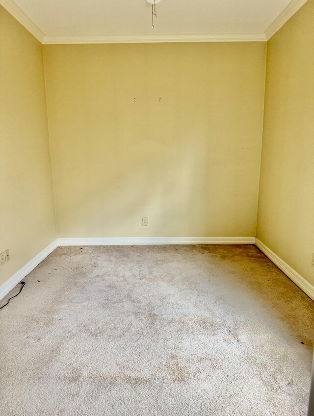 6400 Chasse Gdns, Little Cypress, TX 77632 - carpeted spare room with crown molding and baseboards