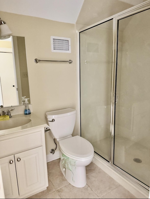 6400 Chasse Gdns, Little Cypress, TX 77632 - bathroom with tile patterned flooring, a stall shower, vanity, and toilet