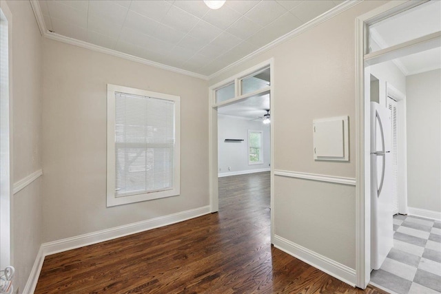2218 Ashley St, Beaumont, TX 77701 - unfurnished room with crown molding, dark wood finished floors, and a ceiling fan
