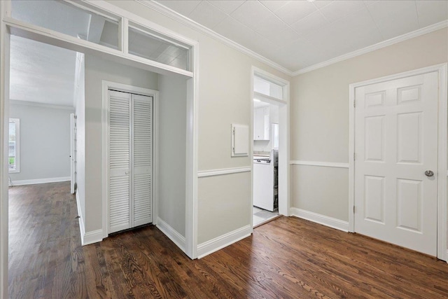 2218 Ashley St, Beaumont, TX 77701 - hallway with crown molding and dark wood-style flooring