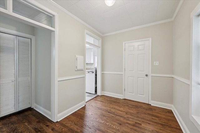 2218 Ashley St, Beaumont, TX 77701 - hallway featuring dark wood-style flooring and crown molding