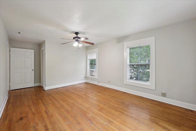 2218 Ashley St, Beaumont, TX 77701 - unfurnished room with healthy amount of natural light, light wood-type flooring, and ceiling fan