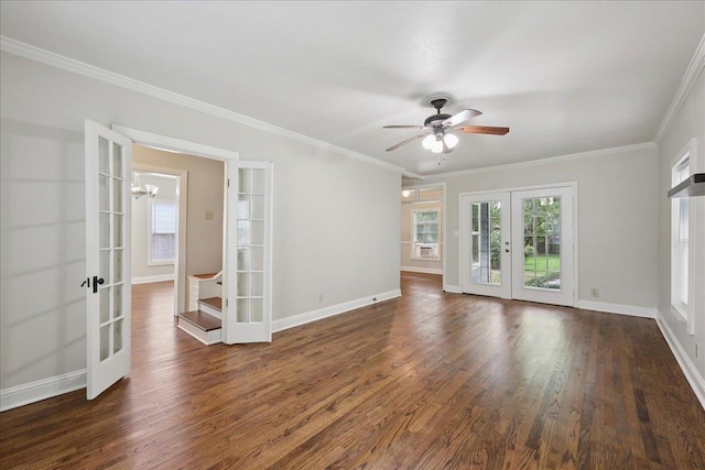 2218 Ashley St, Beaumont, TX 77701 - spare room featuring french doors, dark wood-style floors, a ceiling fan, and crown molding