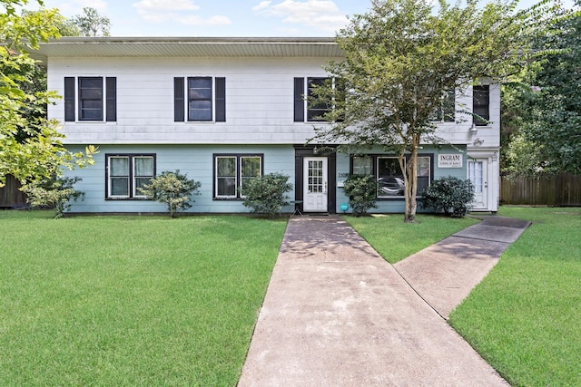 view of front of home featuring a front yard