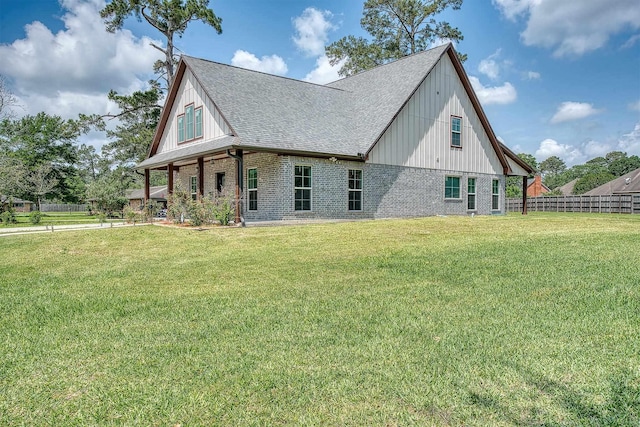 1062 Bassett St, Orange, TX 77632 - view of side of home with brick siding, a shingled roof, and board and batten siding