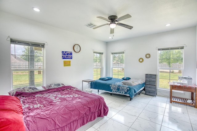 1062 Bassett St, Orange, TX 77632 - bedroom featuring marble look tile flooring, recessed lighting, and a ceiling fan