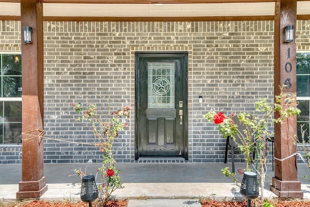 1062 Bassett St, Orange, TX 77632 - doorway to property with brick siding