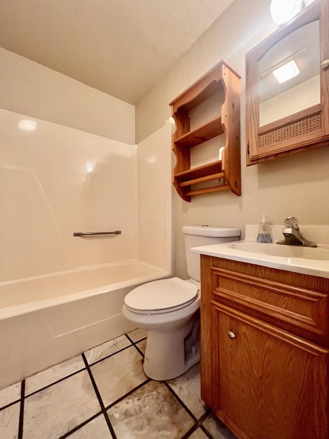 full bathroom with tile patterned floors, vanity,  shower combination, and toilet