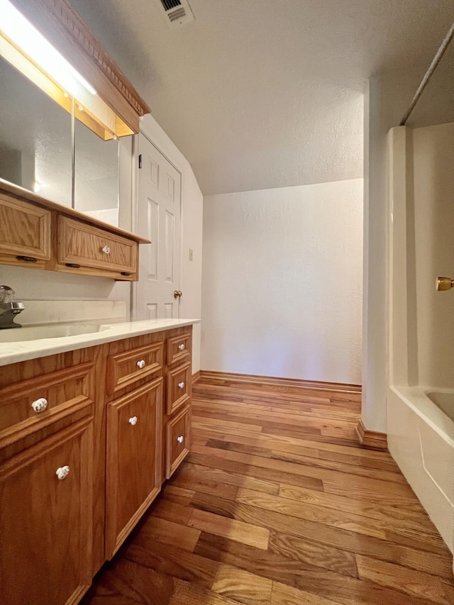 kitchen with hardwood / wood-style floors