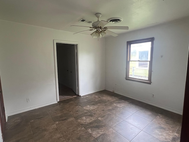 3808 Rachel Ave, Port Arthur, TX 77642 - spare room with baseboards and ceiling fan