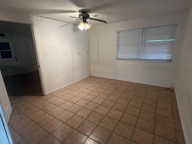 3808 Rachel Ave, Port Arthur, TX 77642 - empty room featuring light tile patterned flooring and ceiling fan