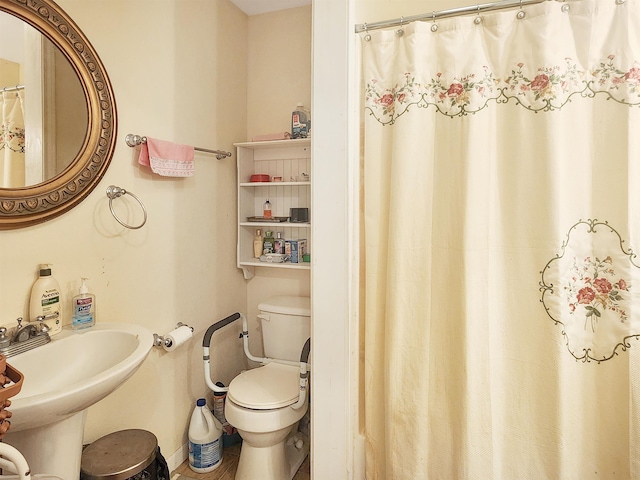 bathroom featuring toilet