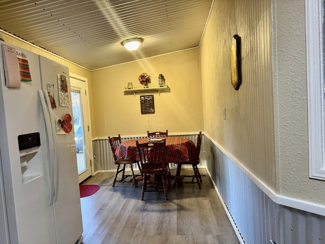 dining area featuring hardwood / wood-style floors