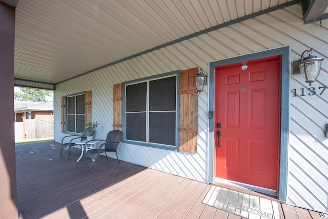 entrance to property with a porch