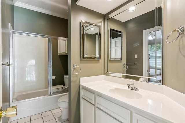 full bathroom featuring bath / shower combo with glass door, vanity, ornamental molding, tile patterned floors, and toilet