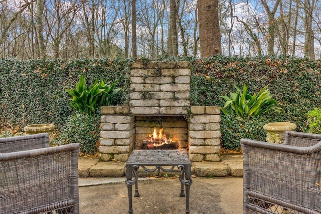 exterior space featuring an outdoor stone fireplace