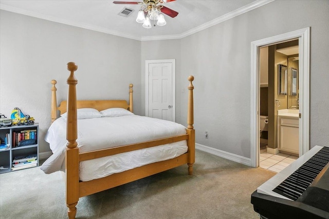 bedroom with light carpet, connected bathroom, ornamental molding, and ceiling fan