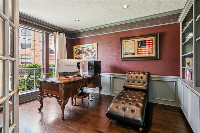 office space featuring ornamental molding, dark hardwood / wood-style flooring, and a textured ceiling