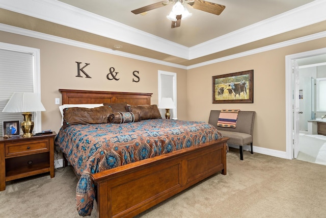 302 Waterwood Dr, Orange, TX 77630 - bedroom featuring light colored carpet, a raised ceiling, crown molding, connected bathroom, and a ceiling fan