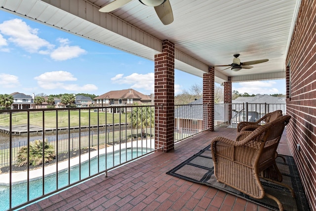 302 Waterwood Dr, Orange, TX 77630 - balcony with ceiling fan, view of pool area, and a residential view
