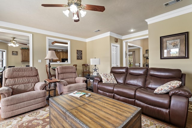 302 Waterwood Dr, Orange, TX 77630 - living room with ceiling fan, ornamental molding, and wood finished floors