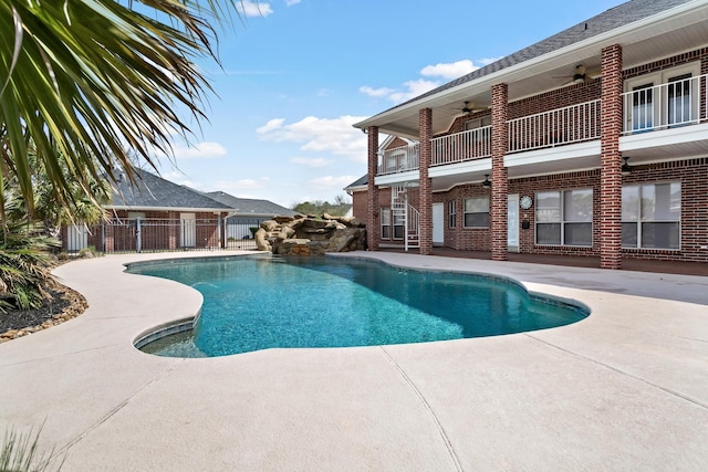 302 Waterwood Dr, Orange, TX 77630 - view of swimming pool featuring a ceiling fan and a patio