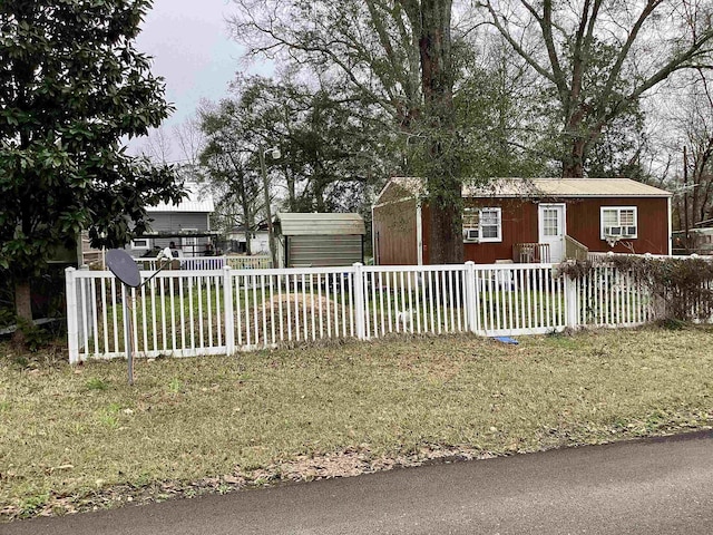 102 S Vallie, Kirbyville, TX 75956 - view of front of property with a fenced front yard and a front yard