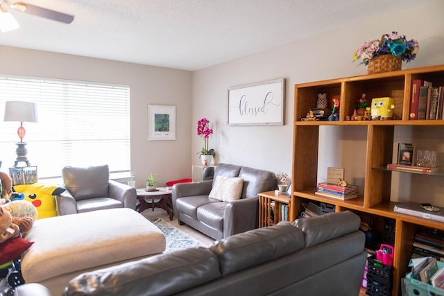 living room with ceiling fan